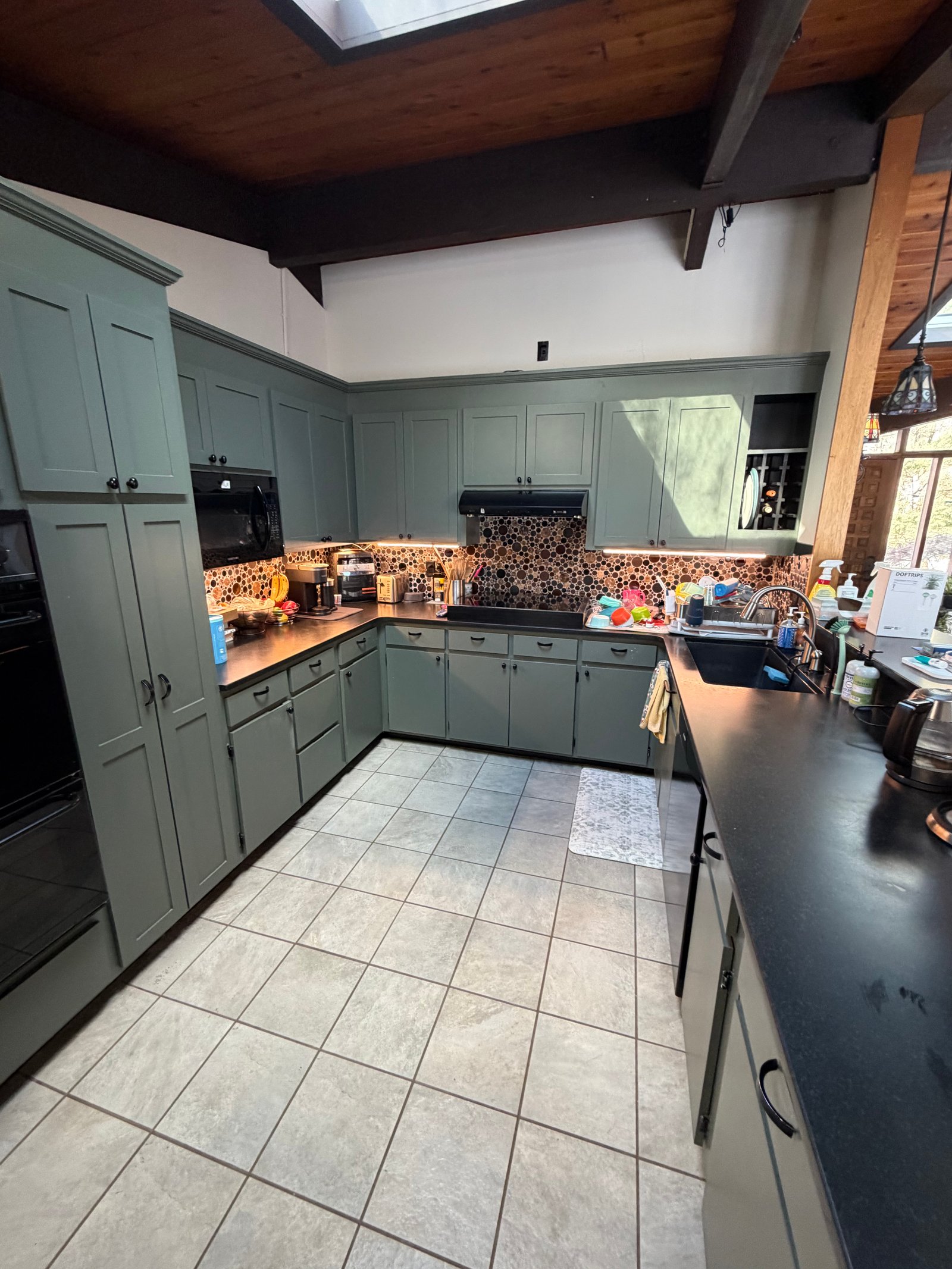 Freshly cleaned kitchen with polished counters and bright cabinetry