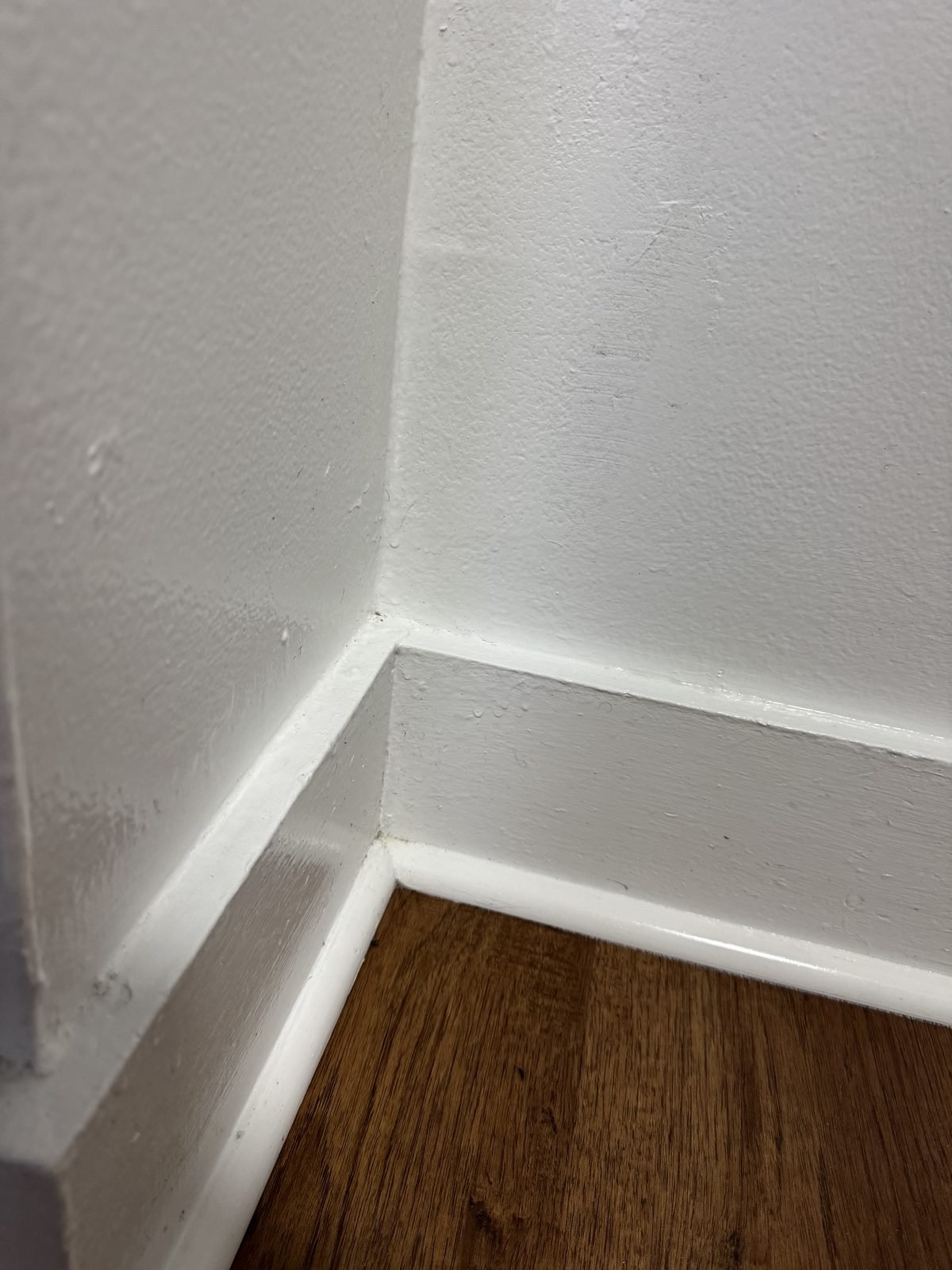 Clean baseboards and corner detail