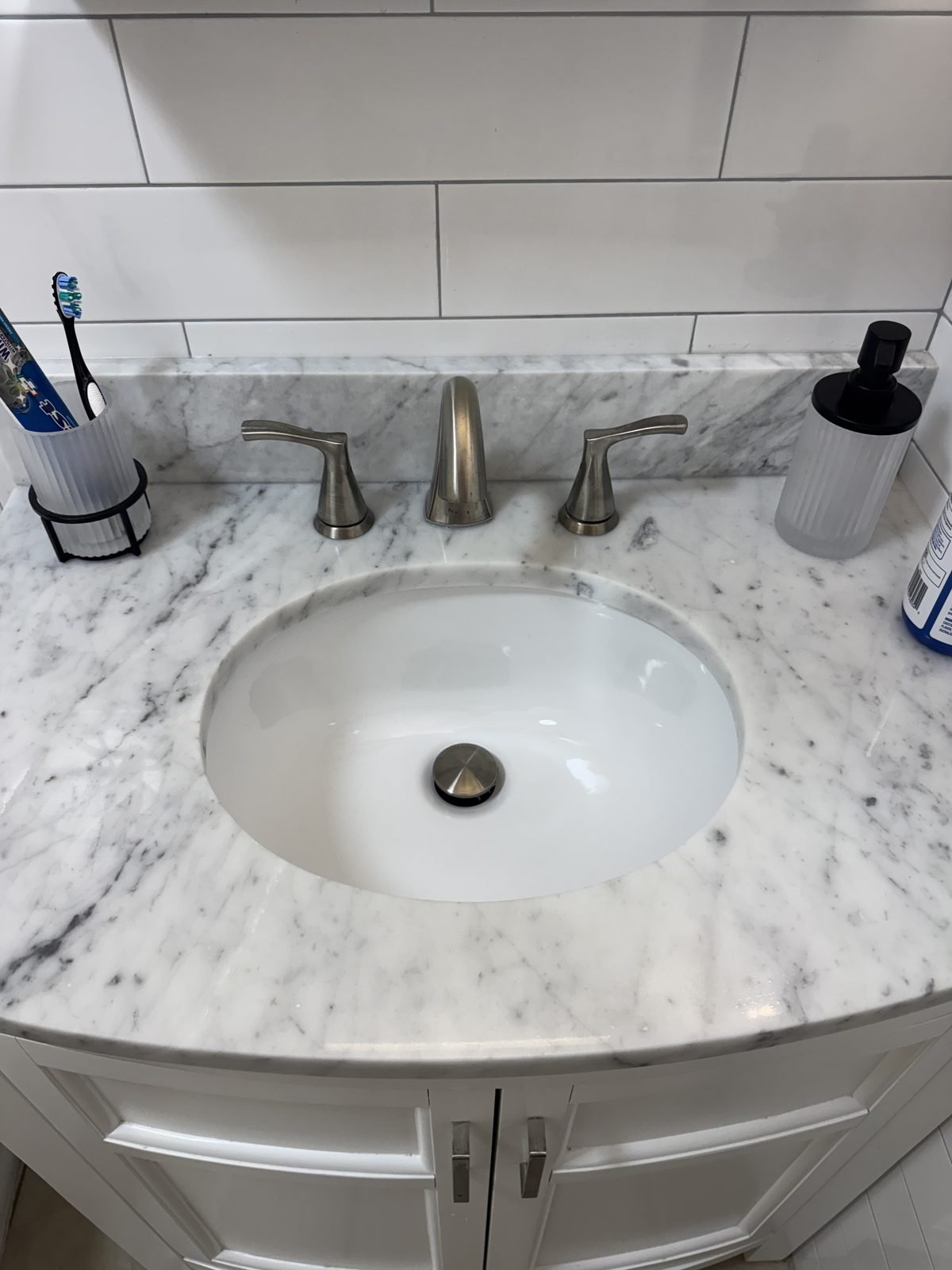 Polished marble bathroom vanity and sink